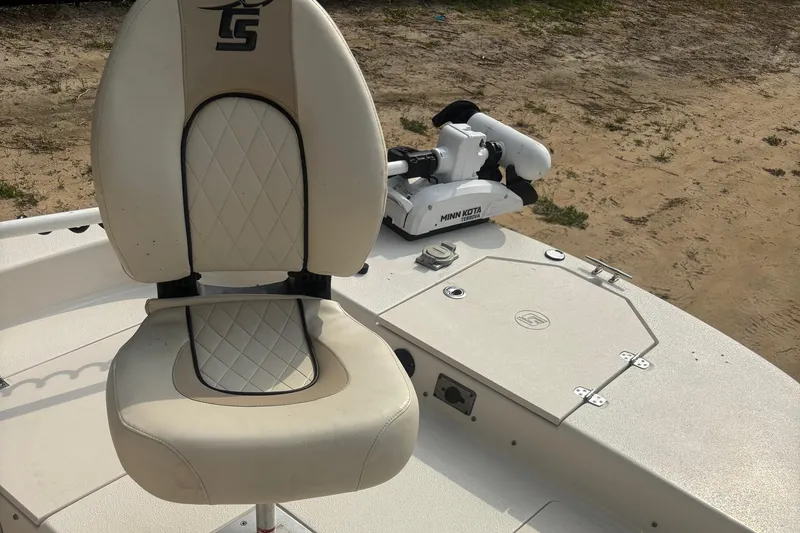 Slide: The Image of 2021 Carolina Skiff 19 LS boat seat and Minn Kota trolling motor. - 6