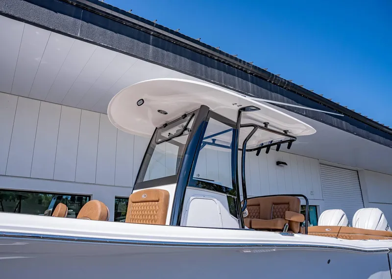 Slide: The Image of 2025 Sea Hunt Ultra 265 SE boat with sleek design and modern features. - 2