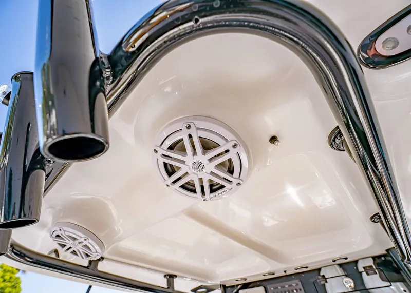 Slide: The Image of 2025 Sea Hunt Ultra 265 SE boat speakers and rod holders, close-up view. - 20
