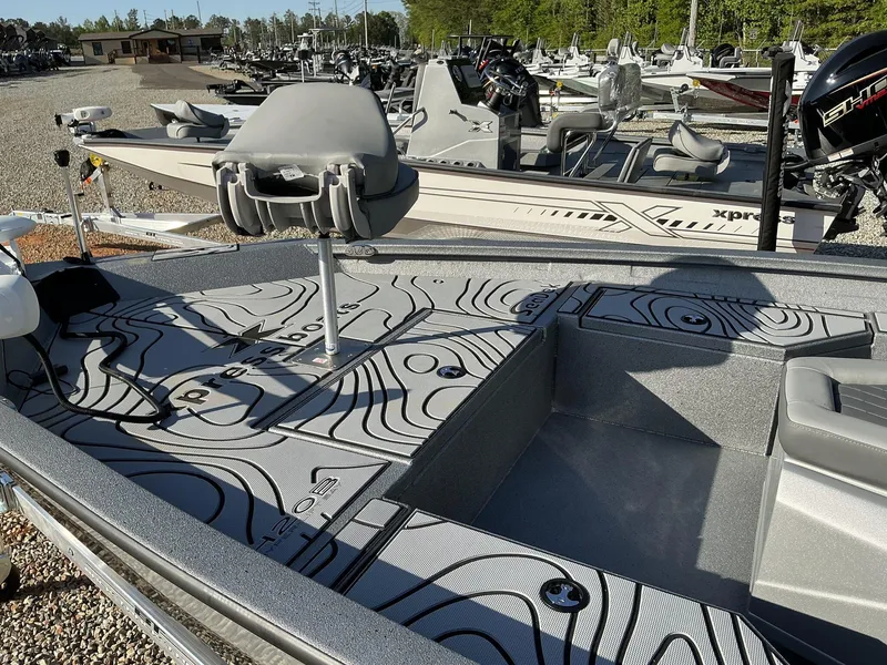 Slide: The Image of 2025 Xpress Hyper-Lift Series H20B boat with new console, sleek design, and modern features. - 10