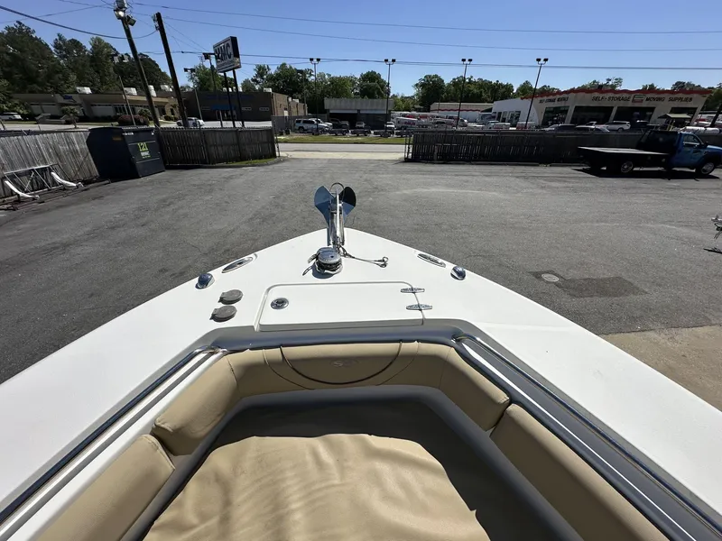 Slide: The Image of Bow view of 2017 Sea Hunt Edge 24 boat in a parking lot setting. - 8