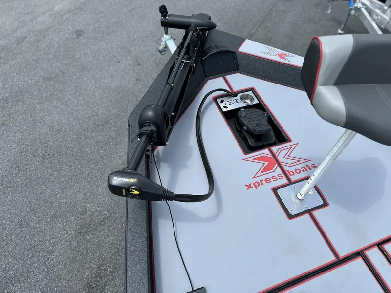 Slide: The Image of 2025 Xpress Hyper-Lift Bass Series boat deck with Minn Kota trolling motor. - 9