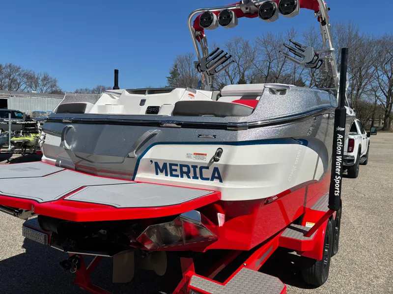 Slide: The Image of 2020 MasterCraft X24 boat with red accents and custom 'MERICA decal. - 3