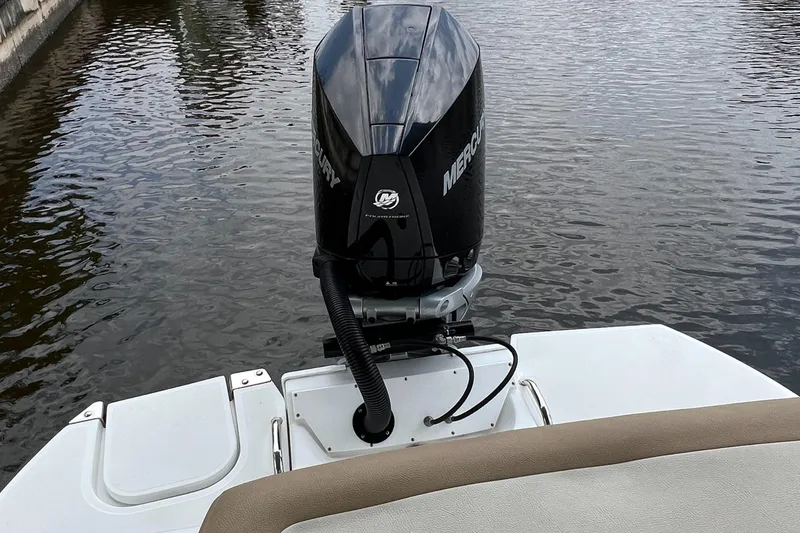 Slide: The Image of 2020 Cobalt 25SC boat with Mercury outboard motor on calm water. - 7