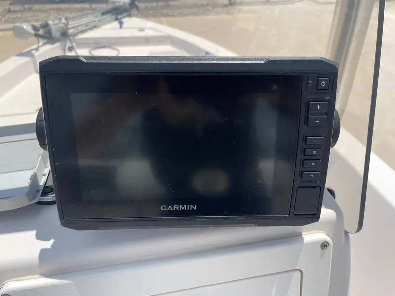 Slide: The Image of Garmin GPS device on 2002 Pathfinder 2200v boat dashboard. - 25