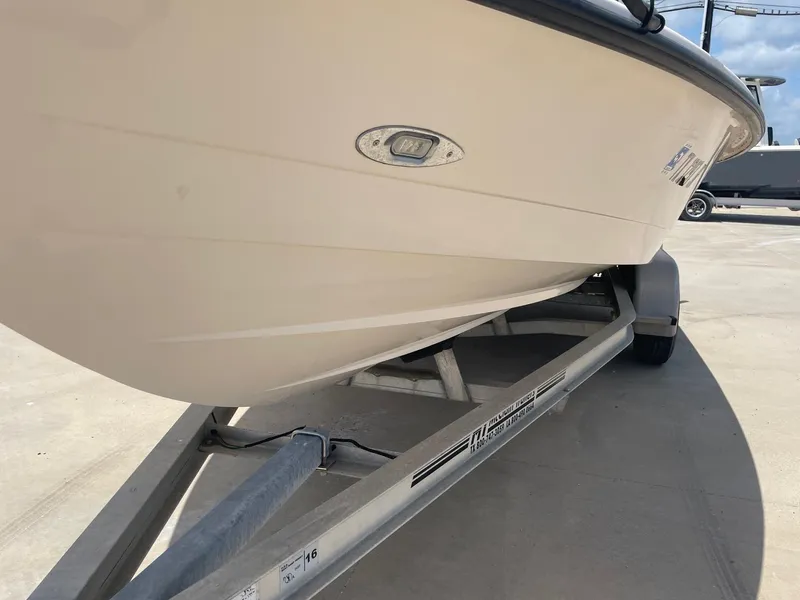 Slide: The Image of 2002 Pathfinder 2200v boat on trailer, side view in sunlight. - 5