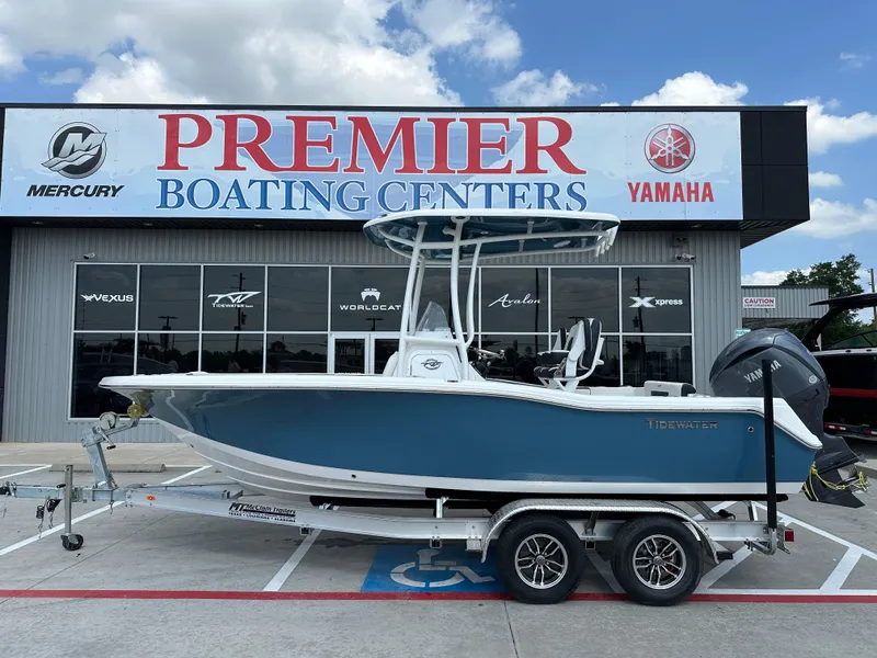 Slide: The Image of 2025 Tidewater 210CC boat on trailer at Premier Boating Centers dealership. - 1