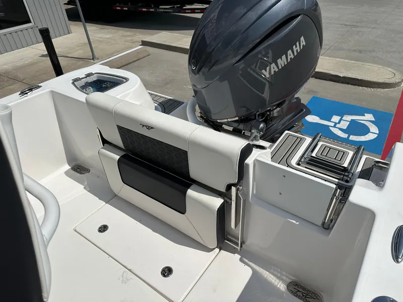 Slide: The Image of 2025 Tidewater 210CC boat with Yamaha engine, featuring sleek seating and modern design. - 16
