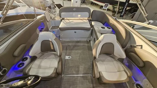 Slide: The Image of 2020 Crownline E 215 XS boat interior with seating and modern design. - 10