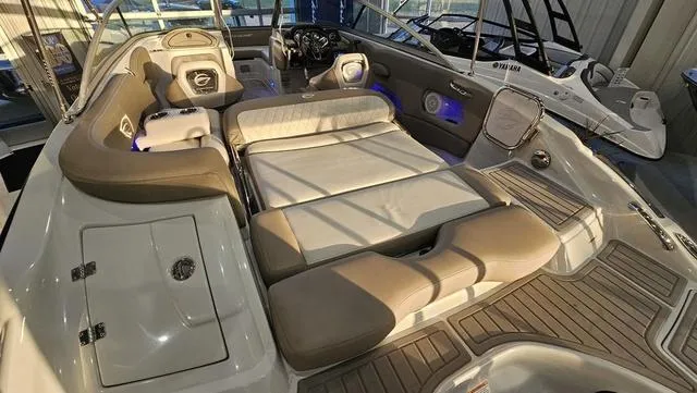Slide: The Image of 2020 Crownline E 215 XS boat interior with spacious seating and modern design. - 8