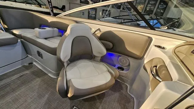 Slide: The Image of Interior of 2020 Crownline E 215 XS boat with plush seating and modern design. - 14