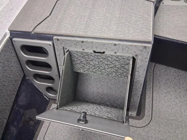 Slide: The Image of 2025 Vexus VX S20 boat storage compartment with open hatch, showcasing interior design. - 10