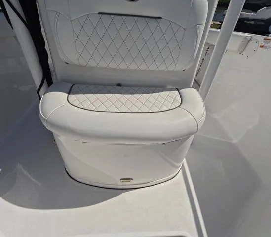 Slide: The Image of 2021 Sportsman Open 232 boat seat with white diamond stitching. - 31