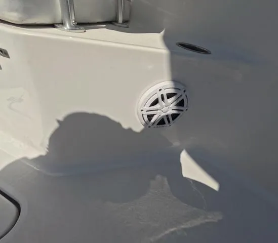 Slide: The Image of 2021 Sportsman Open 232 boat interior with speaker detail, low hours, trailer included. - 39