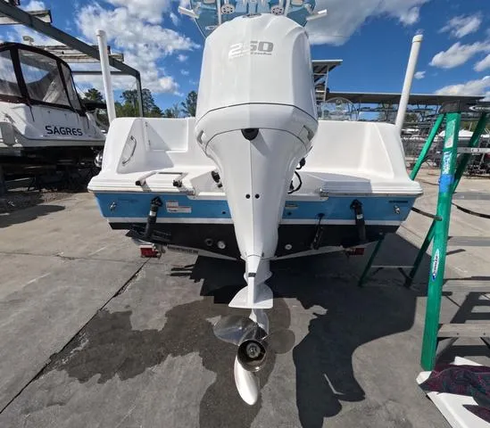 Slide: The Image of 2021 Sportsman Open 232 boat with outboard motor, low hours, trailer included. - 5