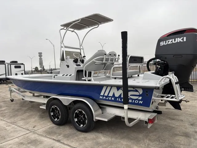 Slide: The Image of 2024 Majek M2 ILLUSION boat on trailer with Suzuki outboard motor. - 2