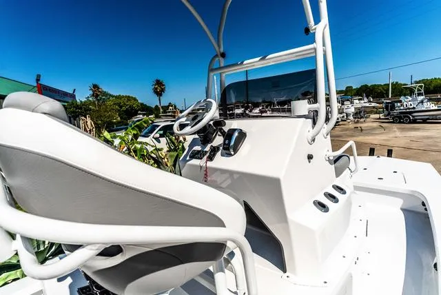 Slide: The Image of 2025 Majek M2 ILLUSION boat with sleek white console and comfortable seating. - 12