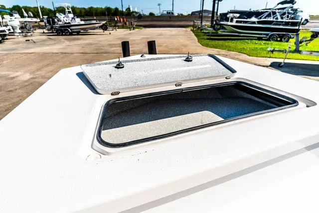 Slide: The Image of 2025 Majek M2 ILLUSION boat hatch open, showcasing sleek design in a marina setting. - 19