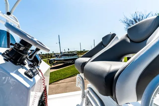 Slide: The Image of 2025 Majek M2 ILLUSION boat interior with sleek seating and modern controls. - 25