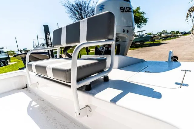 Slide: The Image of 2025 Majek M2 ILLUSION boat with Suzuki engine, featuring sleek seating design. - 6