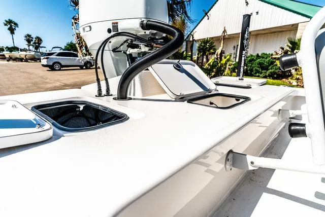 Slide: The Image of 2025 Majek M2 ILLUSION boat deck with storage compartments and control panel. - 7