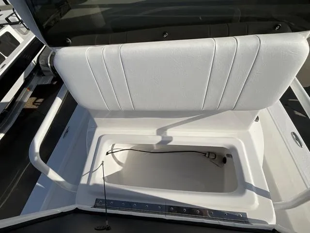 Slide: The Image of 2025 Majek 24 Reaper boat seat with storage compartment, showcasing sleek design and functionality. - 8