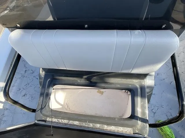 Slide: The Image of 2025 Majek 22 XTREME boat seat with storage compartment, open view. - 11