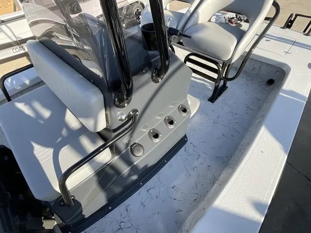 Slide: The Image of 2025 Majek 22 XTREME boat interior with seating and console details. - 12