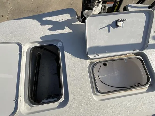 Slide: The Image of 2025 Majek 22 XTREME boat storage compartments, open and ready for use. - 18