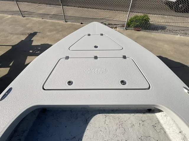 Slide: The Image of 2025 Majek 22 XTREME boat deck with storage compartments, viewed from above. - 7