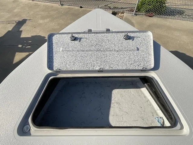 Slide: The Image of Open storage compartment on 2025 Majek 22 XTREME boat deck. - 9