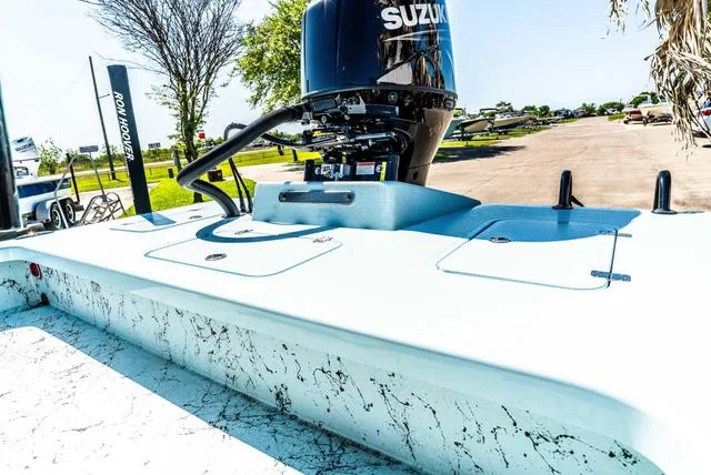 Slide: The Image of 2025 Majek 2206 Illusion boat with Suzuki engine, parked outdoors on a sunny day. - 7