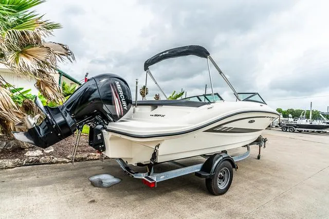 Slide: The Image of 2015 Sea Ray 19spx OB boat with Mercury outboard engine on trailer. - 3