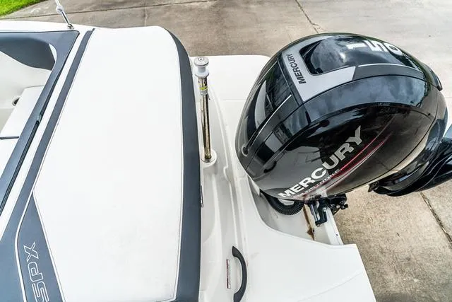Slide: The Image of 2015 Sea Ray 19spx ob boat with Mercury outboard motor, rear view. - 6