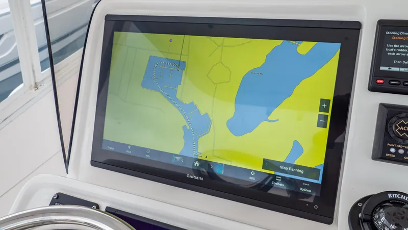 Slide: The Image of Navigation screen on 2022 Intrepid 409 Valor boat, displaying a digital map. - 11