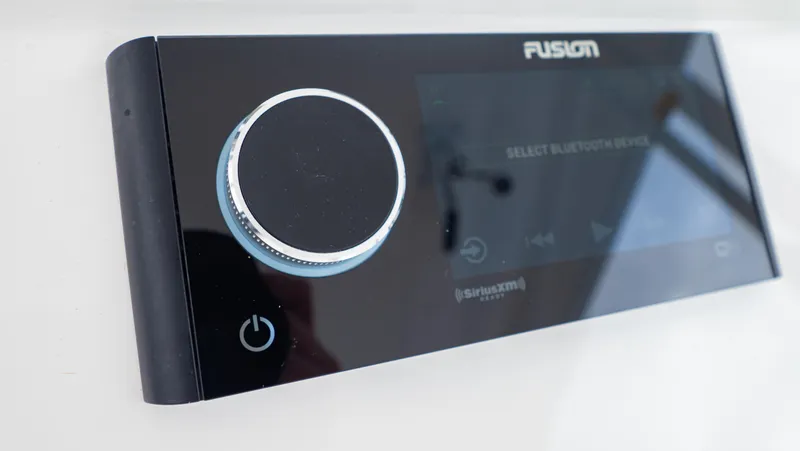 Slide: The Image of Fusion audio control panel on 2022 Intrepid 409 Valor boat. - 14