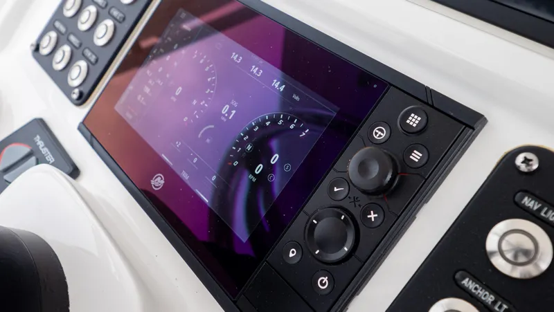 Slide: The Image of Dashboard of 2022 Intrepid 409 Valor boat with digital display and controls. - 20