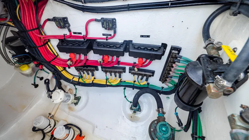 Slide: The Image of Electrical wiring system in a 2022 Intrepid 409 Valor boat. - 48