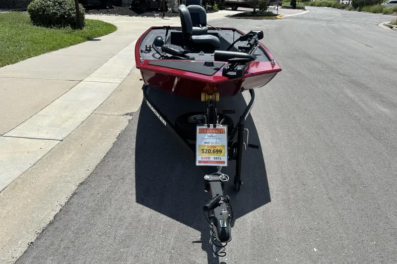 Slide: The Image of 2025 Tracker Panfish 17 boat on sale for $20,699, parked on a street. - 5