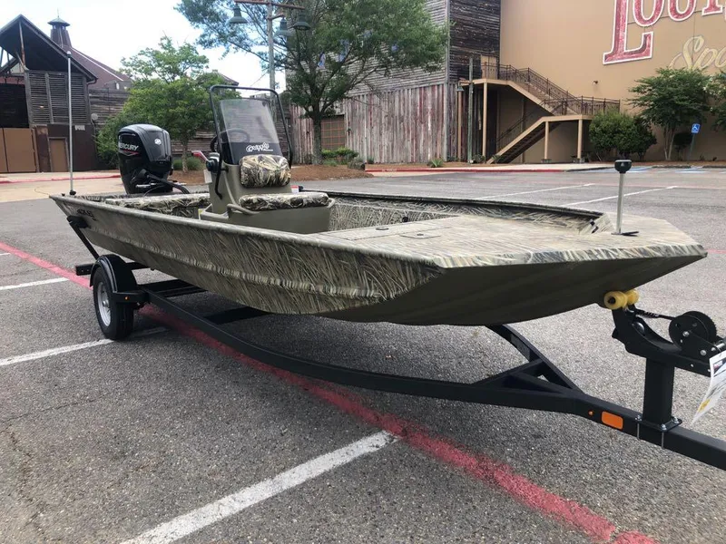 Slide: The Image of 2025 Tracker Grizzly 1860 CC boat on trailer in parking lot. - 6