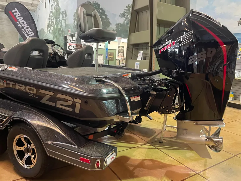 Slide: The Image of 2025 Nitro Z21 XL Pro boat with powerful Mercury engine on display. - 1