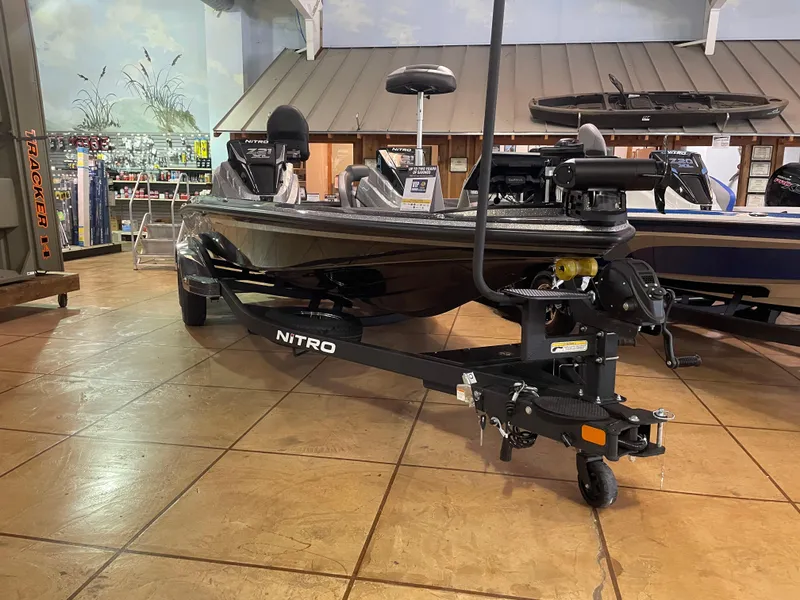 Slide: The Image of 2025 Nitro Z21 XL Pro boat displayed indoors on a trailer. - 6