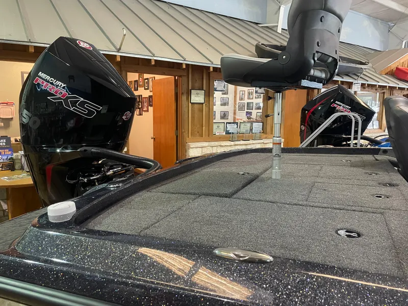 Slide: The Image of 2025 Nitro Z21 XL Pro boat with Mercury Pro XS engines in showroom. - 7