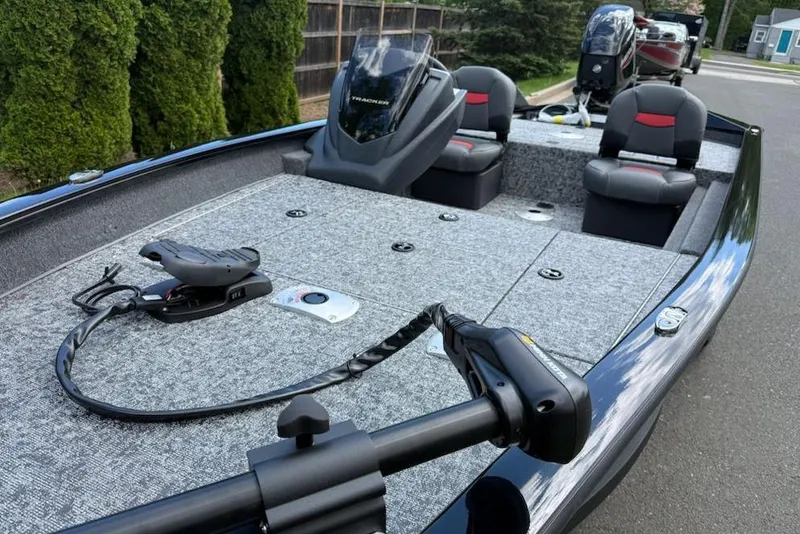 Slide: The Image of 2025 Tracker Pro Team 175 Crappie Edition boat with modern seating and fishing equipment. - 2