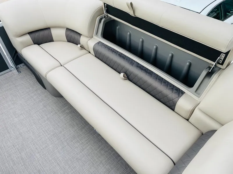 Slide: The Image of 2025 Sun Tracker Party Barge 20 DLX pontoon boat seating with storage compartment. - 14