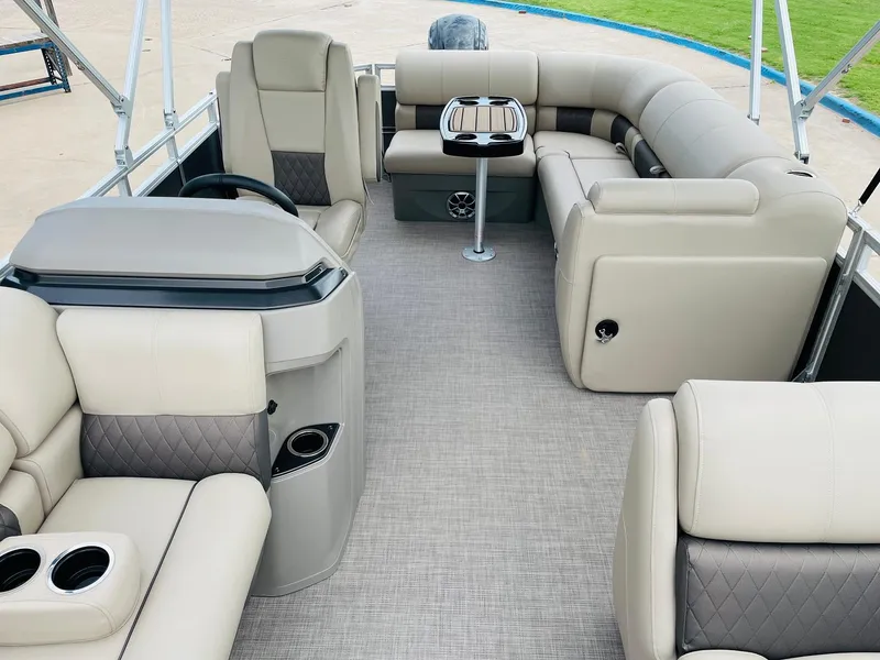 Slide: The Image of 2025 Sun Tracker Party Barge 20 DLX interior with plush seating and modern design. - 18