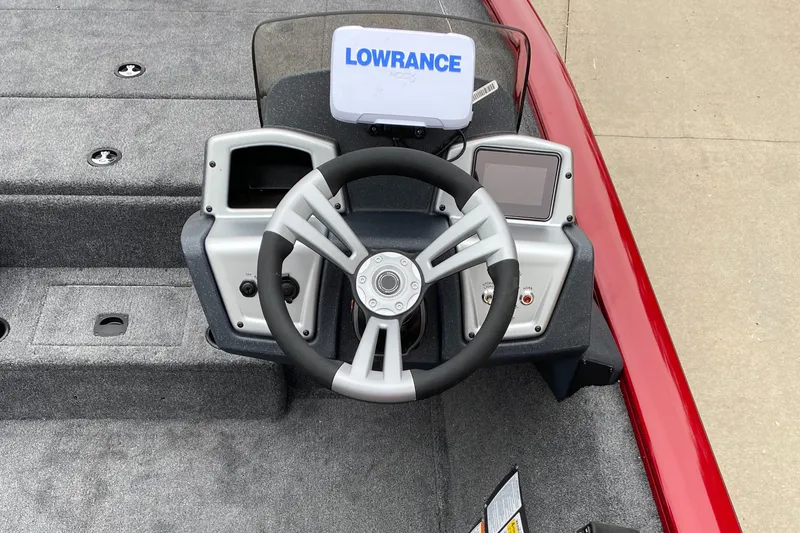 Slide: The Image of Steering console of 2025 Tracker Pro Team 195 Tournament Edition boat with Lowrance system. - 4
