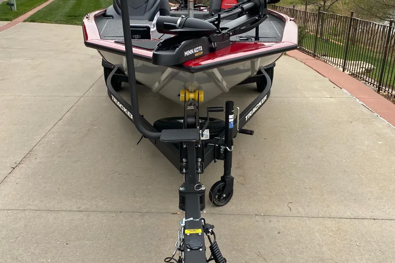 Slide: The Image of 2025 Tracker Pro Team 195 Tournament Edition boat on trailer, front view. - 5