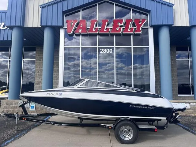 Slide: The Image of 2013 Crownline 18 SS boat on trailer in front of Vallely building. - 1