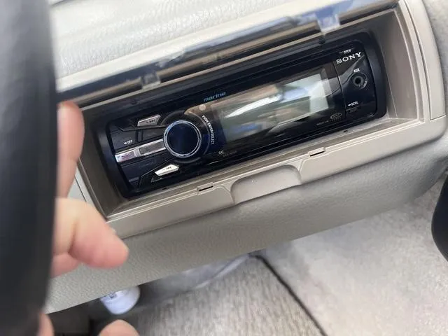 Slide: The Image of Sony stereo system in a 2013 Crownline 18 SS boat dashboard. - 23